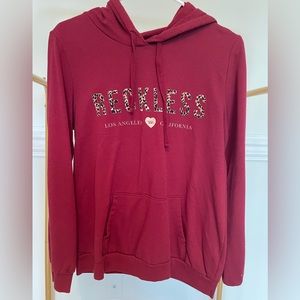 Maroon and leopard print light weight, soft hoodie.